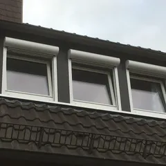 Dreiergaube mit neuer Verkleidung in Holzoptik